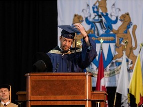 Paul Brandt receives an honorary degree from Mount Royal University on Friday. Photo by Leonora Andre, Mount Royal University.