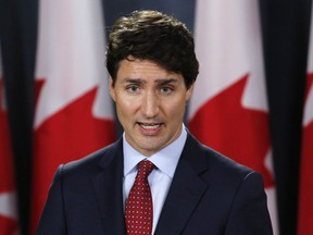 Prime Minister Justin Trudeau speaks at a press conference on Parliament Hill in Ottawa on Thursday, May 31, 2018. Trudeau says it is "insulting" that President Donald Trump says Canada's steel industry poses a national security risk to the United States.