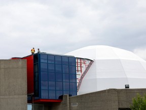 The old planetarium/ Science Centre in Calgary being worked on Monday June 18, 2018.