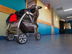 A stroller sits parked outside a bedroom at Inn from the Cold in Calgary. Inn from the Cold is one of the few shelter options for families in the city.