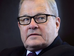 Lawrence MacAulay, Minister of Agriculture and Agri-Food, takes part in a press conference in Ottawa on Wednesday, June 13, 2018.