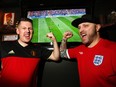 Nicolas Jekill (left) and Joshua White are pumped as they watch the kick off to the World Cup at The Ship and Anchor Pub on 17th Avenue S.W. in Calgary on June 14, 2018.