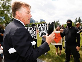 File photo: Stephen Garvey was confronted by protesters as he read a statement to media on Saturday, June 24, 2017.