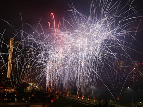 Fireworks are set off from the Centre St Bridge during Canada Day 150 celebrations on Riverfront Avenue in downtown Calgary on Saturday July 1, 2017. The spectacular display took about 30 minutes. Jim Wells//Postmedia