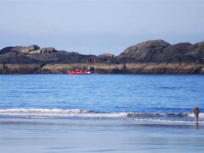 Coast Guard searches for three people missing after a boat capsized near Tofino, B.C., on Friday, June 15, 2018.