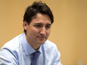 Prime Minister Justin Trudeau listens during a discussion with the Indigenous Advisory and Monitoring Committee, on the Cheam First Nation near Chilliwack, B.C., on Tuesday June 5, 2018.