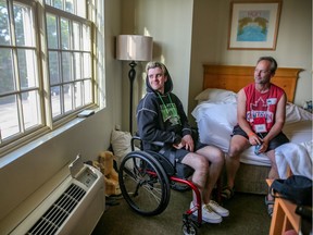 Ryan Straschnitzki  and his dad Tom hang out in their room at Ronald McDonald House in Philadelphia on Tuesday June 26, 2018. Leah Hennel/Postmedia