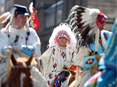 A member of the Tsuut'ina Nation rides in the 2018 Calgary Stampede Parade on Friday July 6, 2018. Leah Hennel/Postmedia
