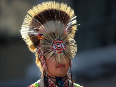 A member of Siksika Nation rides in the 2018 Calgary Stampede Parade in Calgary, on Friday July 6, 2018. Leah Hennel/Postmedia