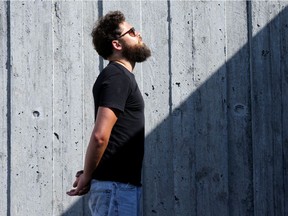 Mike Rosenberg - otherwise known as Passenger - stands atop the Canadian War Museum in Ottawa. Julie Oliver/Postmedia