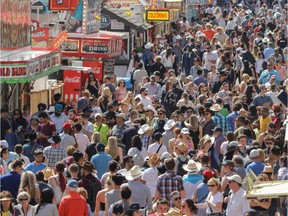 Big crowd on Sunday at at the 2018 Calgary Stampede in Calgary, Ab., on Sunday July 8, 2018. Mike Drew/Postmedia