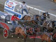 Codey McCurrach, left, beats Doug Irvine to the wire in  Heat 5 at the Calgary Stampede in Calgary, Ab., on Sunday July 8, 2018. Mike Drew/Postmedia