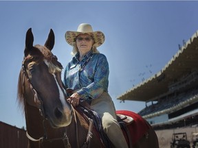 Doris Heintz, 82, competes in the Extreme Dog & Pony Race on Friday, July 13 at the Calgary Stampede. Heintz is one of only two Canadians to have been inducted into the Extreme Cowboy Hall of Fame. Kerianne Sproule/Postmedia