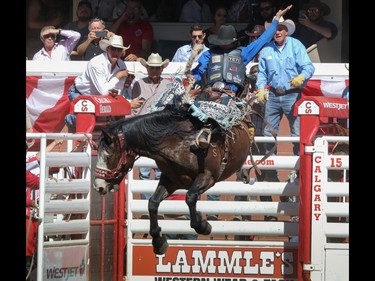 Ryder Wright, Milford, Utah, wins the Saddle Bronc final in the Stampede Rodeo at the Calgary Stampede in Calgary, Ab., on Sunday July 15, 2018. Mike Drew/Postmedia