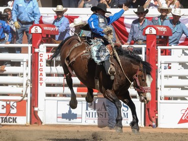 Ryder Wright, Milford, Utah, wins the Saddle Bronc final in the Stampede Rodeo at the Calgary Stampede in Calgary, Ab., on Sunday July 15, 2018. Mike Drew/Postmedia