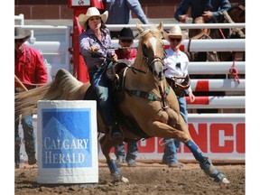 Hailey Kinsel from Cotulla, Texas, was the fastest on the day in ladies barrel racing at the Calgary Stampede rodeo, Thursday July 12, 2018. Gavin Young/Postmedia