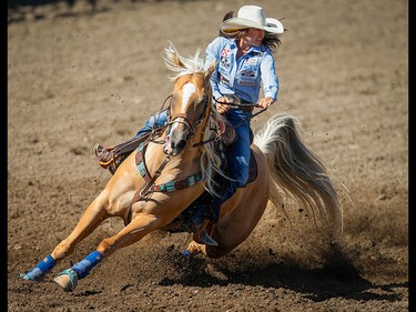 Hailey Kinsel of Cotulla, Texas sailed around the barrels in a time of 17.07 seconds to win the barrel racing event on Championship Sunday during the 2018 Calgary Stampede on Sunday, July 15, 2018. Al Charest/Postmedia