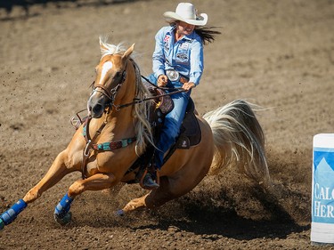 Hailey Kinsel of Cotulla, Texas sailed around the barrels in a time of 17.07 seconds to win the barrel racing event on Championship Sunday during the 2018 Calgary Stampede on Sunday, July 15, 2018. Al Charest/Postmedia