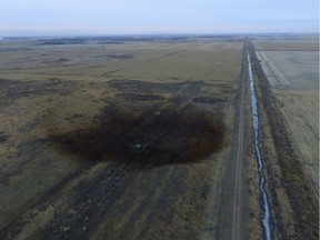 This aerial photo shows spills from TransCanada Corp.'s Keystone pipeline, Friday, Nov. 17, 2017, that leaked an estimated 210,000 gallons of oil onto agricultural land in northeastern South Dakota, near Amherst, S.D., the company and state regulators said Thursday, but state officials don't believe the leak polluted any surface water bodies or drinking water systems. Crews shut down the pipeline Thursday morning and activated emergency response procedures after a drop in pressure was detected resulting from the leak south of a pump station in Marshall County, TransCanada said in a statement. The cause was being investigated. (DroneBase via AP) ORG XMIT: CER208