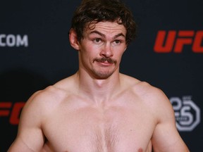 Olivier Aubin-Mercier weighs in at the Hyatt Regency in Calgary on Friday, July 27, 2018. (Jim Wells/Postmedia)