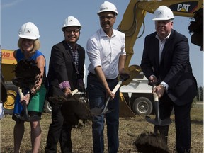 Enoch Cree Nation Chief Billy Morin, Kinder Morgan president Ian Anderson, Premier Rachel Notley and Natural Resources Minister Amarjeet Sohi take part in the groundbreaking ceremony at the Enoch Cree stockpile site July 27.