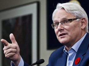 BC Premier Gordon Campbell answers questions at a press conference at his office in Vancouver Nov 4, 2010. Campbell announced his resignation Wednesday Nov. 3,