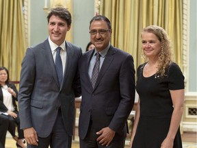 Edmonton Mill Woods MP Amarjeet Sohi, centre, stands with Prime Minister Justin Trudeau and Gov. Gen. Julie Payette after being sworn in as minister of natural resources during a swearing-in ceremony at Rideau Hall in Ottawa on Wednesday, July 18, 2018.