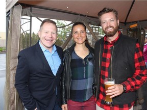 Pictured, from left, at the Marriott International's 3rd Annual Lobster BBQ  held June 22 are Abe Brown, executive director, Inn from the Cold, Aurora Eggert and celebrity judge Ian Mitchell. Funds raised at the crustacean cook-off competition supported Inn from the Cold.