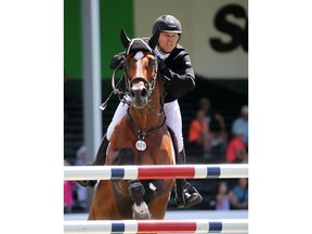 USA's Kent Farrington and Jasper won the Imperial Winning Round at the Spruce Meadows North American show jumping event on Saturday July 7, 2018.  Gavin Young/Postmedia