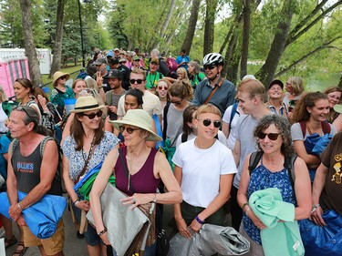 Fans line up before the "running of the tarps"  at the start of the Calgary Folk Festival on Prince's Island on Thursday July 26, 2018.