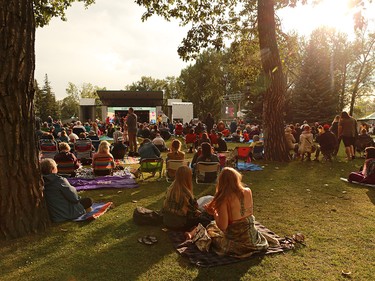 The evening sun warms up Calgary Folk Festival goers after a showery opening night, Thursday July 26, 2018.