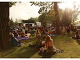 The evening sun warms up Calgary Folk Festival goers after a showery opening night, Thursday July 26, 2018.  Gavin Young/Postmedia