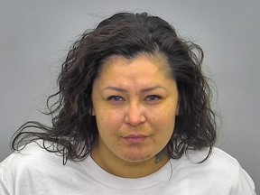 This photo provided by the Burleigh-Morton County Detention Center in Bismarck, N.D., shows Red Fawn Fallis, of Denver. Fallis, who accused of shooting at officers during protests in North Dakota against the Dakota Access oil pipeline in 2016 is scheduled to be sentenced Wednesday afternoon, July 11, 2018, in Bismarck. She pleaded guilty in January to civil disorder and a weapons charge. Prosecutors are recommending seven years in prison, though federal Judge Daniel Hovland can go up to 15 years. (Burleigh-Morton County Detention Center via AP)
