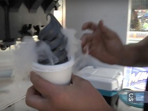 Charcoal ice cream at the 2018 Calgary Stampede. Taken from Roving Reporter video.