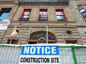 A building under renovation in 100 blk of Stephen Avenue Mall (8 Ave SW) in downtown Calgary on Wednesday, July 25, 2018. A sign in the window says it will be a 420 clinic. Jim Wells/Postmedia