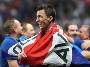 Croatia’s Mario Mandzukic celebrates at the end of the World Cup semifinal match against England at Luzhniki Stadium in Moscow on July 11, 2018. Mandzukic scored the winning goal in the 2-1 decision in the second half of extra time.