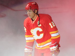 Jarome Iginla takes to the ice at opening ceremonies of season opener between the Calgary Flames and the Pittsburgh Penguins in NHL  hockey action at the Scotiabank Saddledome  in downtown Calgary, Alberta on October 8, 2011. STUART DRYDEN/CALGARY SUN/QMI AGENCY
