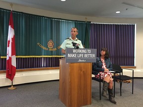 Brig-Gen Trevor Cadieu and MLA Nicole Goehring speak at a news conference at the Calgary Military Family Resource Centre in Calgary Monday.