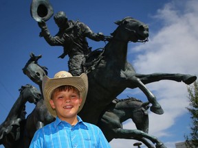 11-year-old Jackson Ammerman after winning a couple of Team Cattle Penning events with his family at the 2018 Calgary Stampede on Monday, July 9, 2018. Al Charest/Postmedia