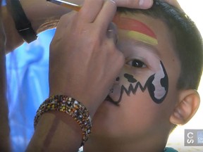 Face painting at the BOM Kids Zone