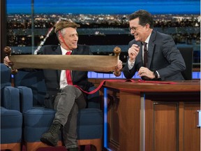 This Jan. 31, 2017 image released by CBS shows Jon Stewart, left, with host Stephen Colbert during a visit to "The Late Show with Stephen Colbert,"  in New York.