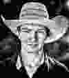 Bull rider Cody McPeak, 25, from Aldersyde, poses for a portrait before competing.