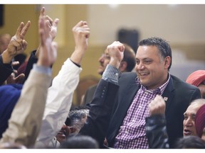 Prab Gill, right, celebrates his byelection win in the Calgary-Greenway riding on March 22, 2016.