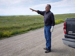 Former Blood Tribe Chief Harley Frank gestures from his truck on disputed land near his home near Spring Coulee , Alta., Thursday, July 5, 2018.THE CANADIAN PRESS/Jeff McIntosh ORG XMIT: JMC207