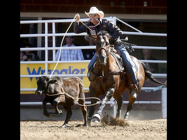 Tuf Cooper from Weatherford, TX, wins  the Tie Down Roping Championships on day 10 of the 2018 Calgary Stampede rodeo on Sunday July 15, 2018. Darren Makowichuk/Postmedia