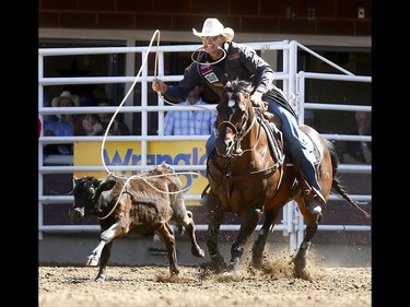 Tuf Cooper from Weatherford, TX, wins  the Tie Down Roping Championships on day 10 of the 2018 Calgary Stampede rodeo on Sunday July 15, 2018. Darren Makowichuk/Postmedia