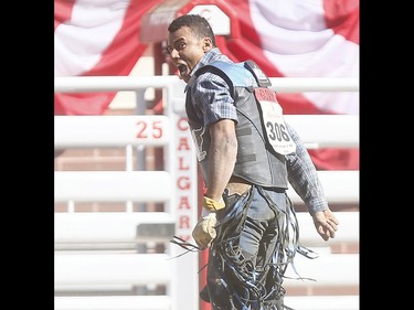 Marcos Gloria from Edmonton,AB, riding Rattler wins the Bull Riding Championships on day 10 of the 2018 Calgary Stampede rodeo on Sunday July 15, 2018. Darren Makowichuk/Postmedia