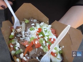 Roving reporter Cayla Spiess takes a look at the Zeus Poutine, a new food on the 2018 Stampede midway.