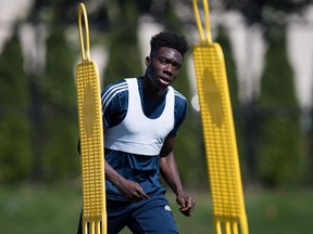 Vancouver Whitecaps midfielder Alphonso Davies runs during MLS soccer team practice in Vancouver on Monday, July 23, 2018.