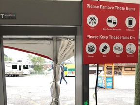 A sign at at 2018 Calgary Stampede security screening area.